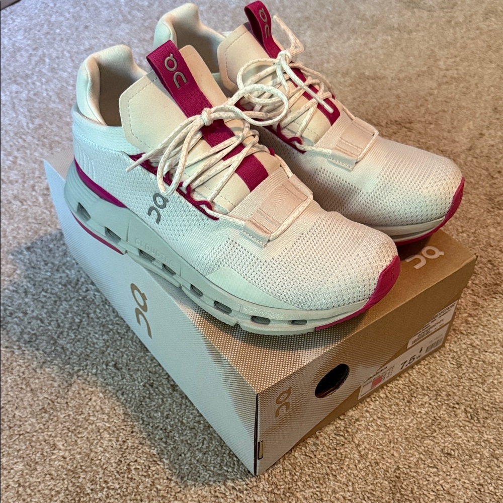 On Running White and Pink Athletic Shoes